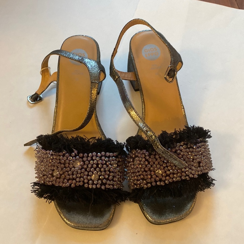 silver shoes with a purple bead accent